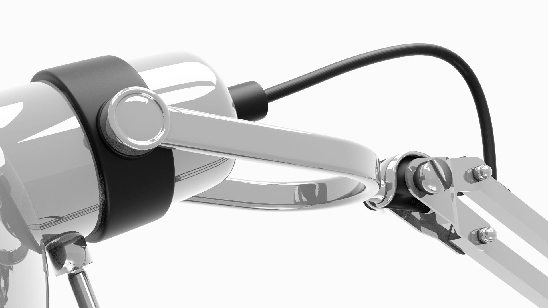 Macro — shade collar and hinge, with the cable looping over the arm.